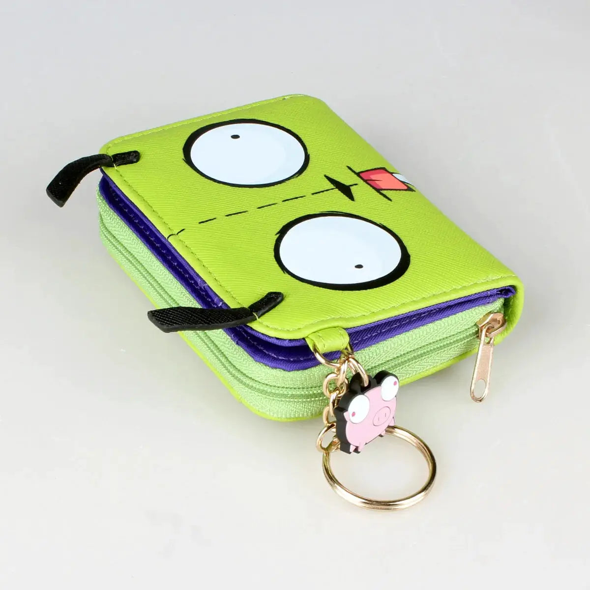 3D trifold wallet in green with purple zipper and pig keychain charm