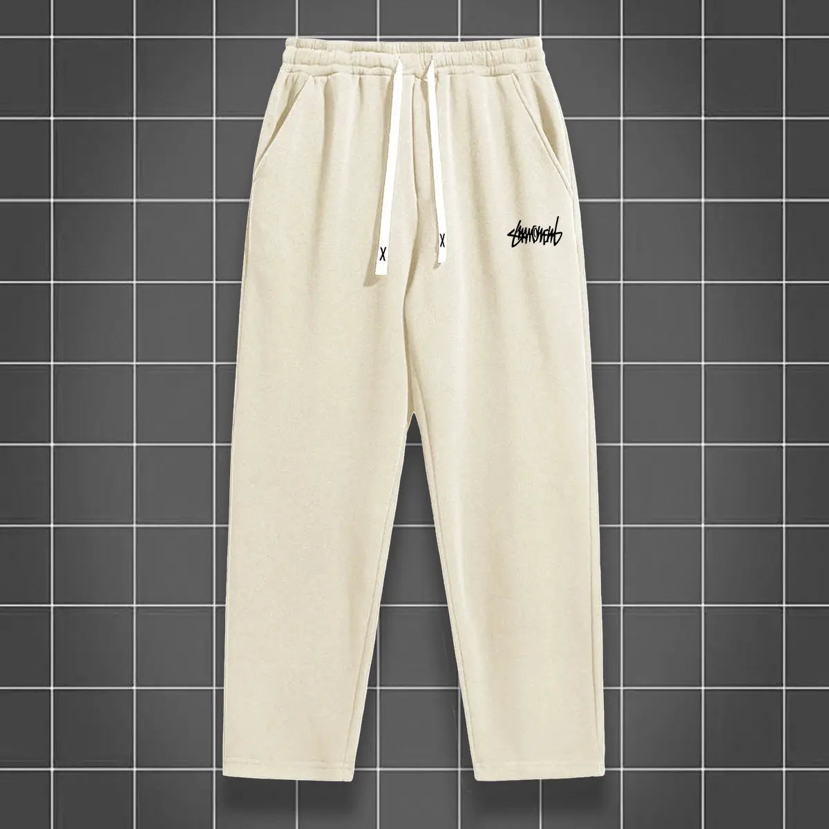 Men's cream solid-color straight-leg jogging pants with drawstring waistband and front pockets by Simples Market