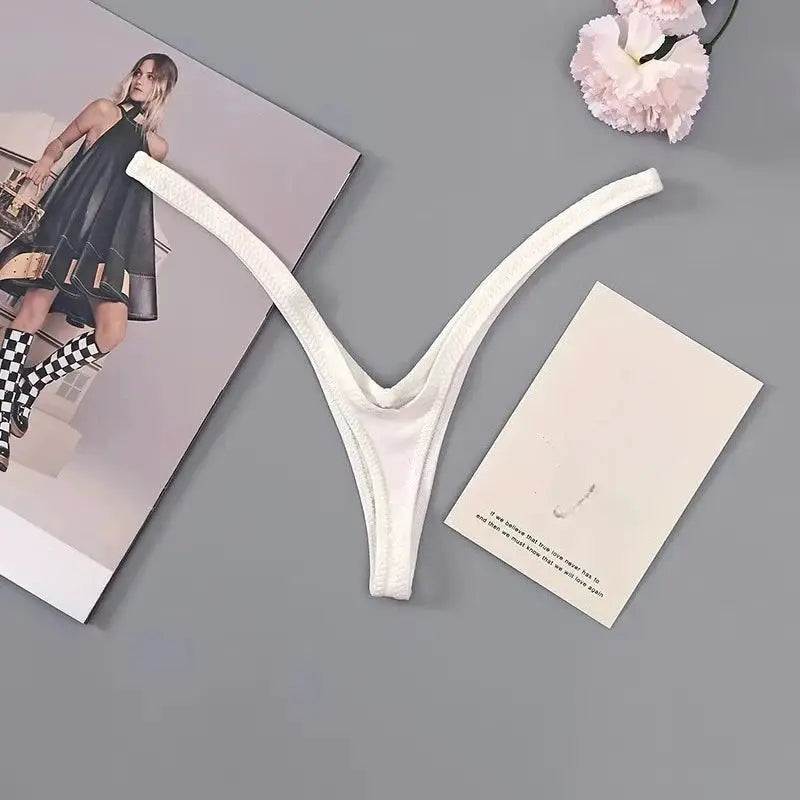 Women thong underwear, white, low-rise Brazilian style with thin straps, Simples Market.