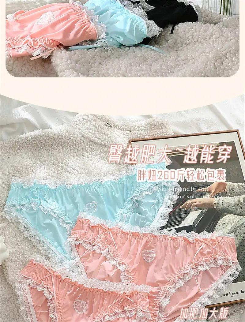 Plus size lace panties set of 3 in pastel pink, light blue, and peach with white lace trim.