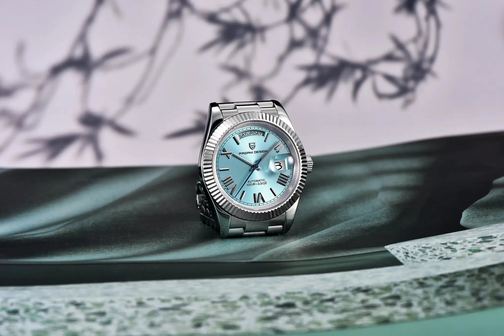 Pagani Design men's stainless steel watch with light blue dial and day-date display
