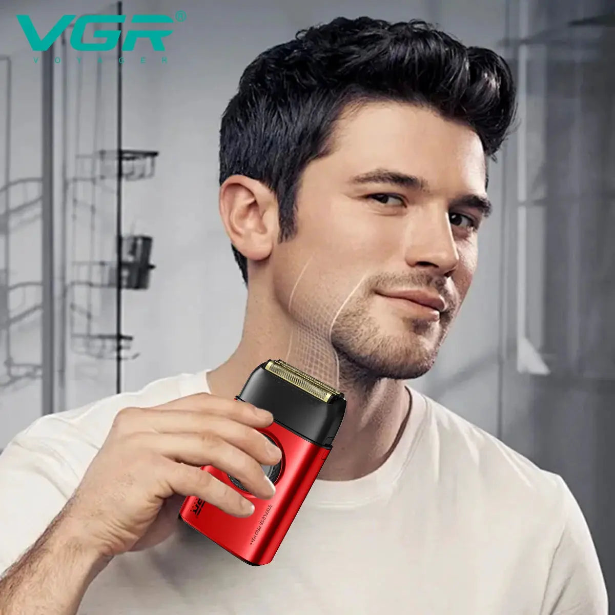 VGR red electric shaver with black head held by man; brand logo visible