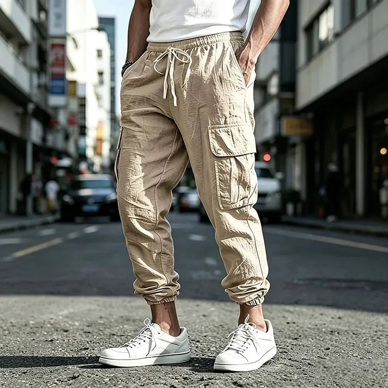 Simples Market men's beige cargo jogger pants with elastic waist, drawstring and multiple pockets; cotton-linen blend