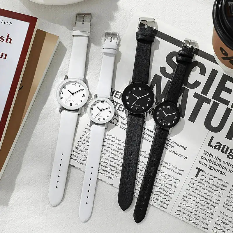 Four leather-strap wristwatches in white and black for men and women, quartz casual watches with Arabic dials