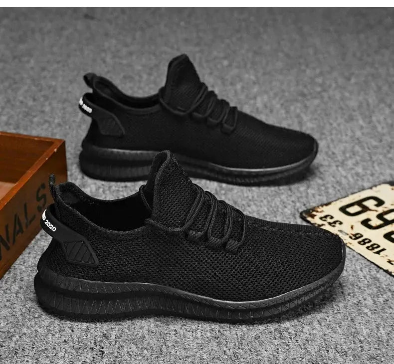 Men's black knit sneakers with breathable mesh upper and non-slip sole (2 shoes)