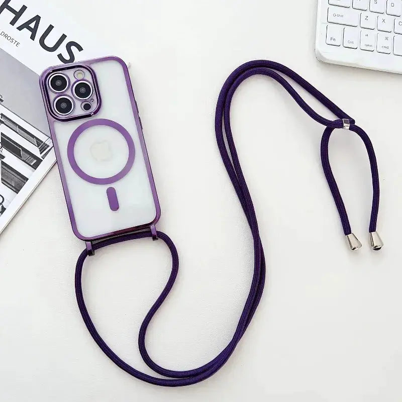 Crossbody lanyard phone case in purple with transparent back and MagSafe ring for iPhone