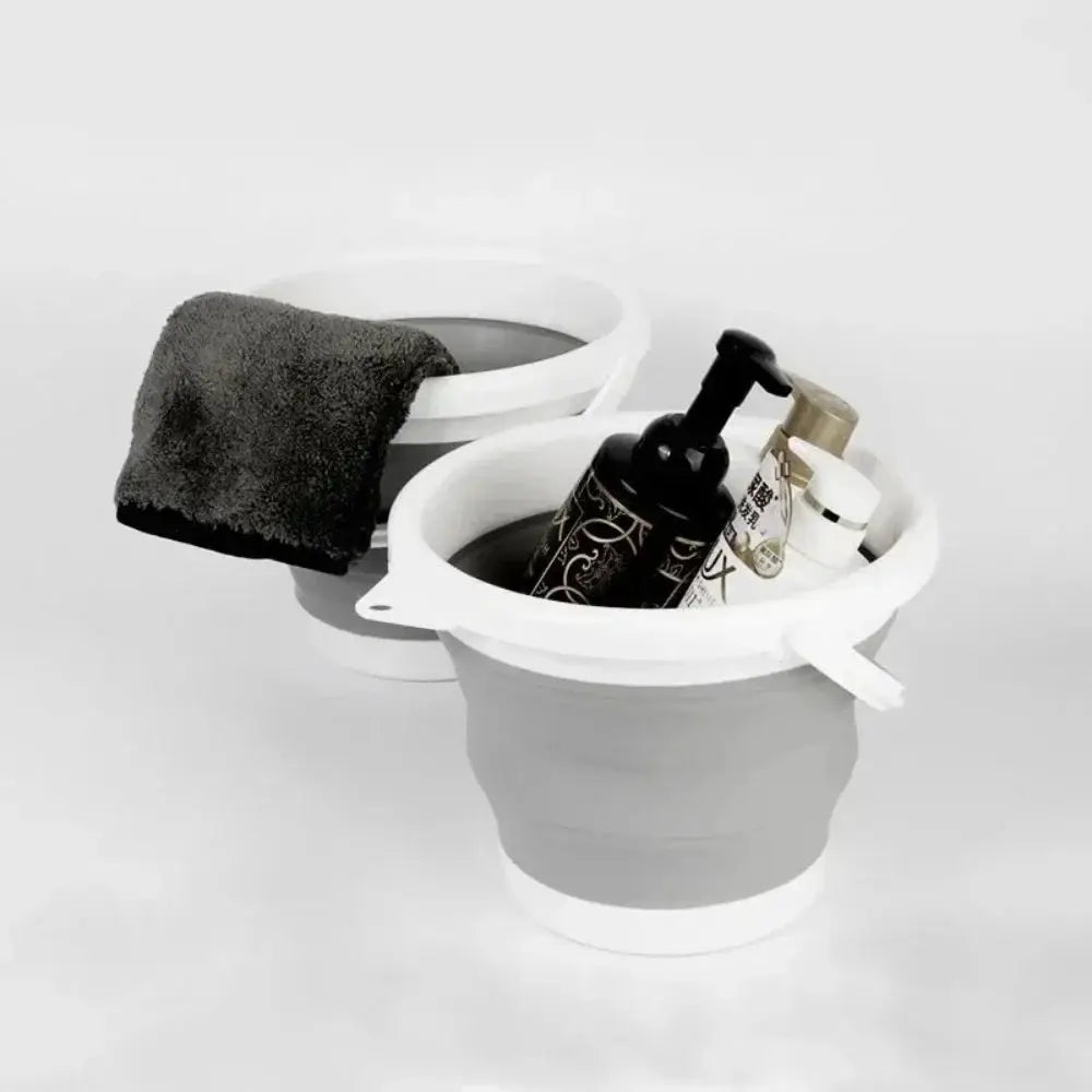 Two 3-Liter foldable buckets with white rims and gray bodies, one holding car-wash bottles.
