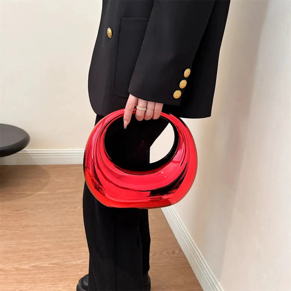 MOODS Golden Evening red PVC round-handle wrist bag clutch