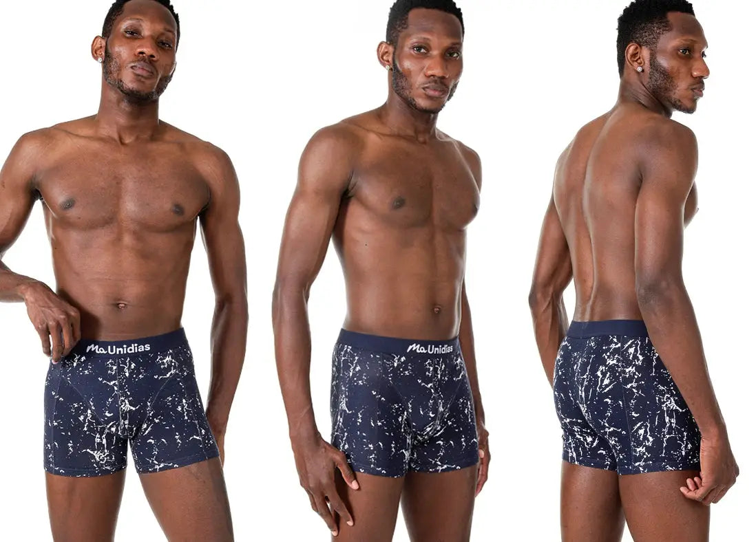 Men's navy cotton print boxers with white marble pattern, front, side, and back views.