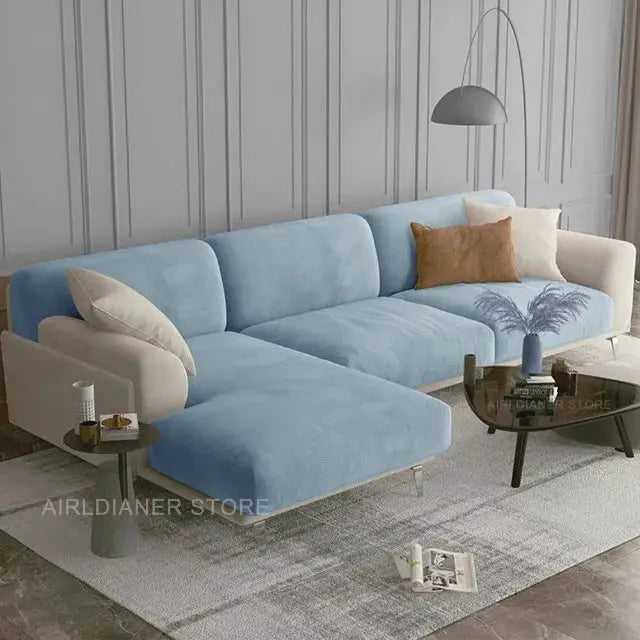 Luxury soft velvet sofa seat cover in blue with elastic edges, protects living room furniture from pets