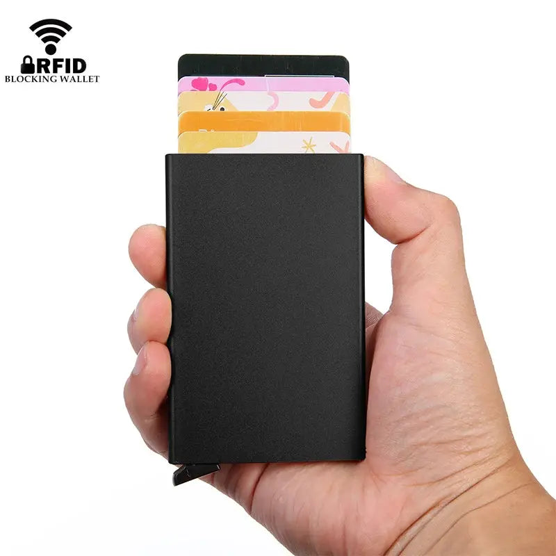 RFID-blocking aluminum mini wallet by Simples Market with 4 cards