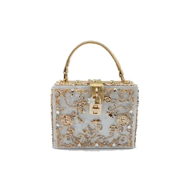 Evening crystal handbag by Simples Market, light gray box clutch with gold floral filigree and crystal accents.