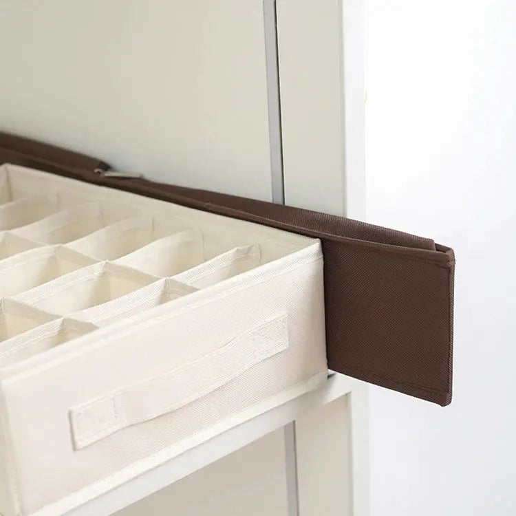 Socks and underwear organizer storage box in beige fabric with brown side panel and divided compartments