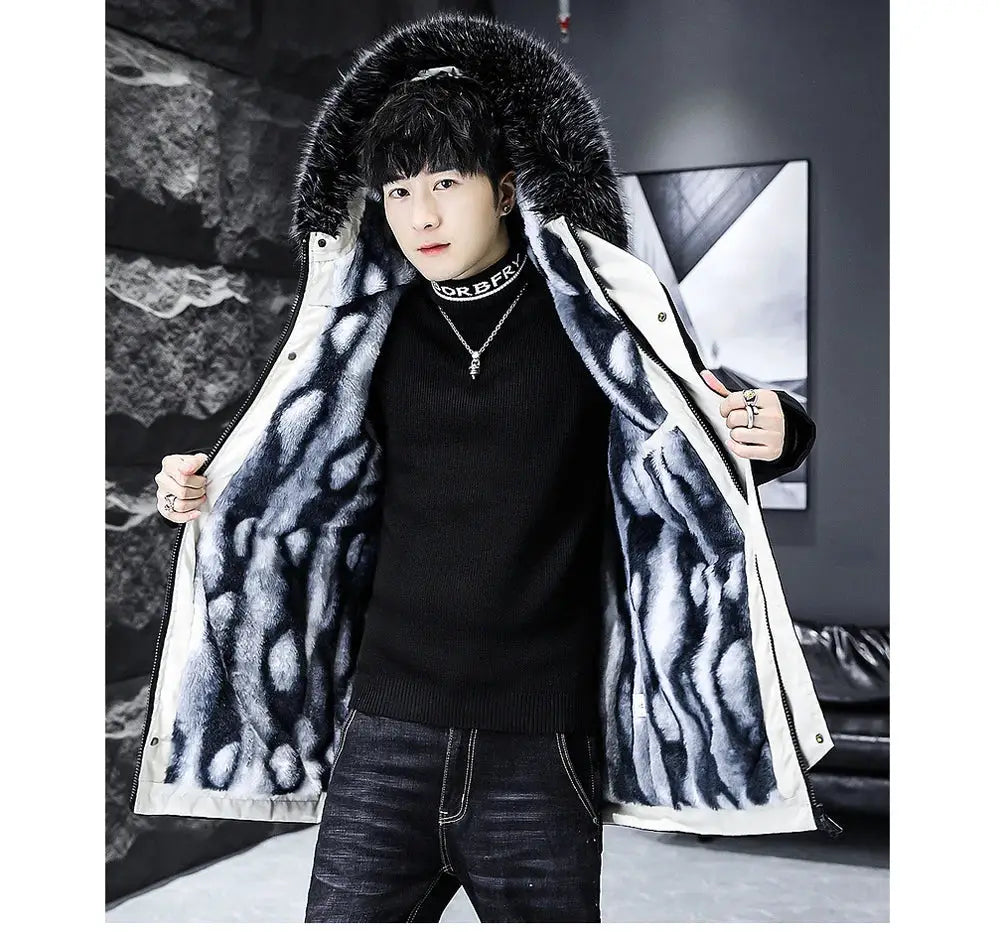 Winter men's long down jacket with fur-trimmed hood, white shell and blue-gray faux fur lining.