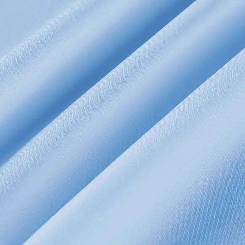 Men's business casual short-sleeve shirt fabric close-up in light blue solid color