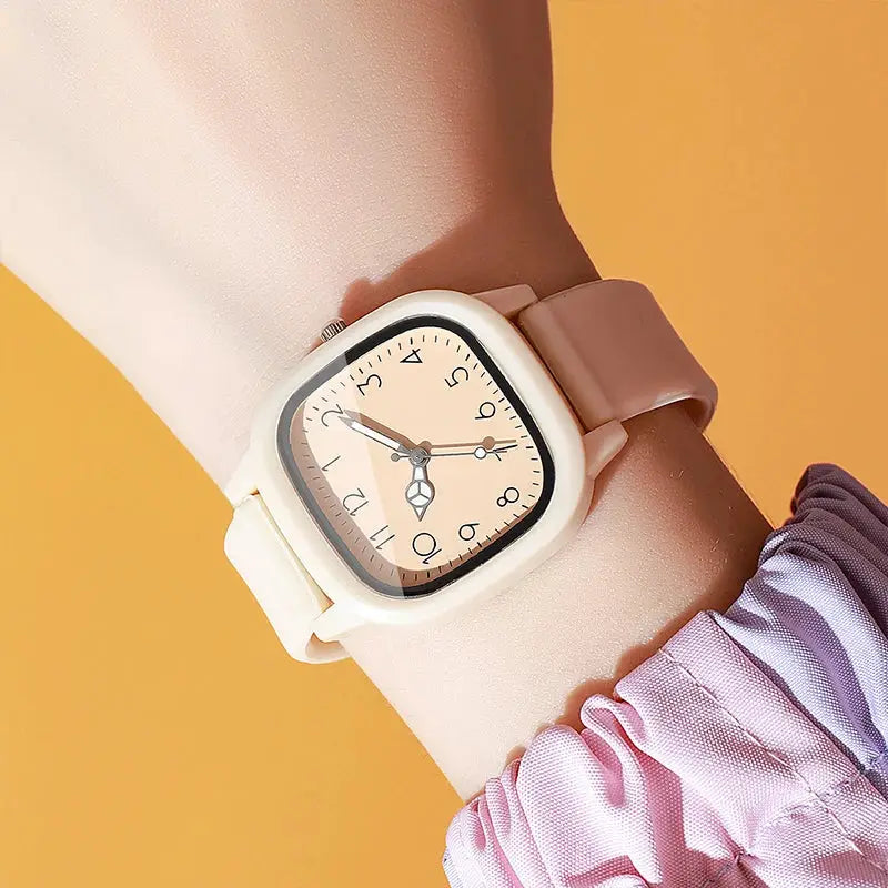 Women's pink silicone-band quartz wristwatch with beige Arabic dial