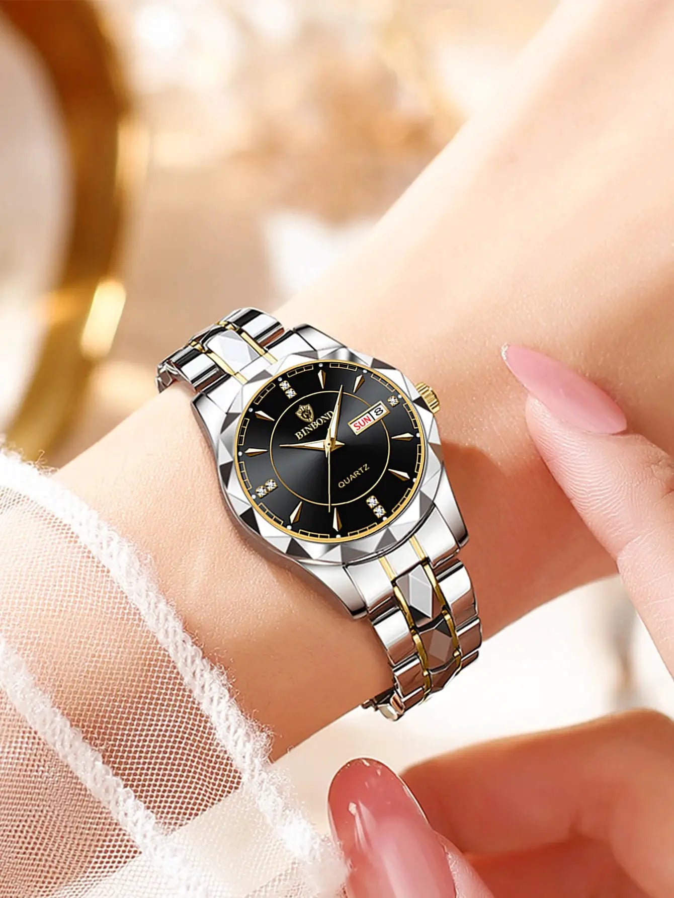 BINBONG women's luxury stainless steel quartz wristwatch with black dial and two-tone silver-gold bracelet