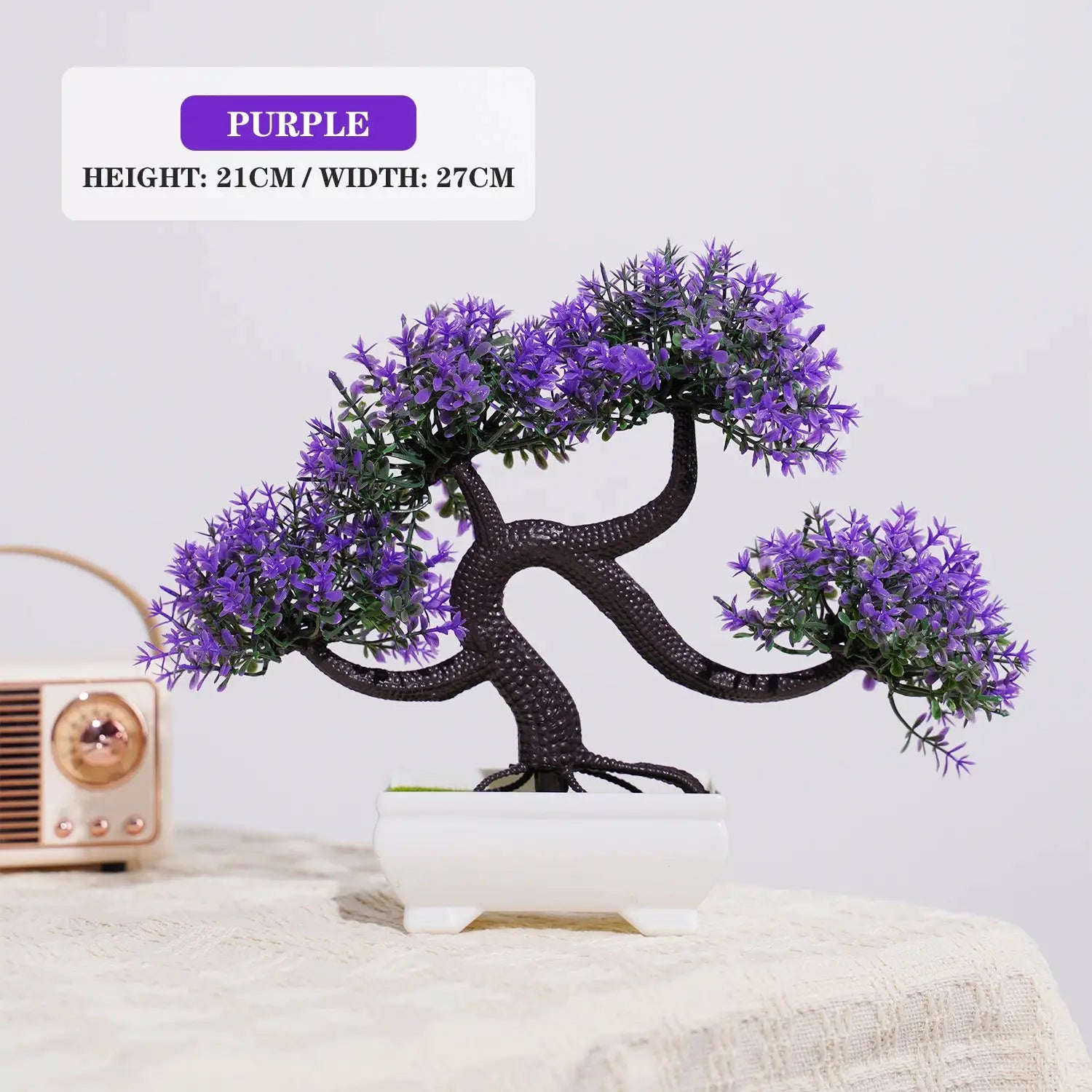 Artificial bonsai small tree with purple blossoms in a white ceramic pot for tabletop home decor