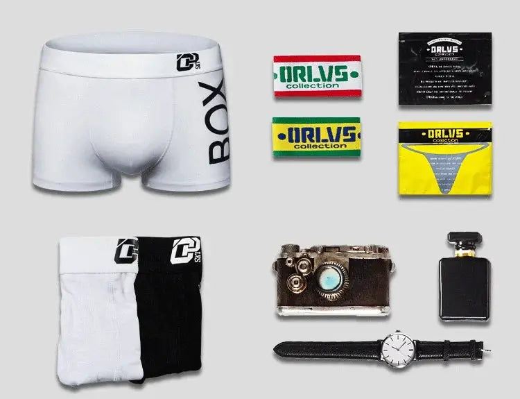 Men's white cotton boxer underwear with UP pouch; URiVS collection labels and items including a camera and a watch.