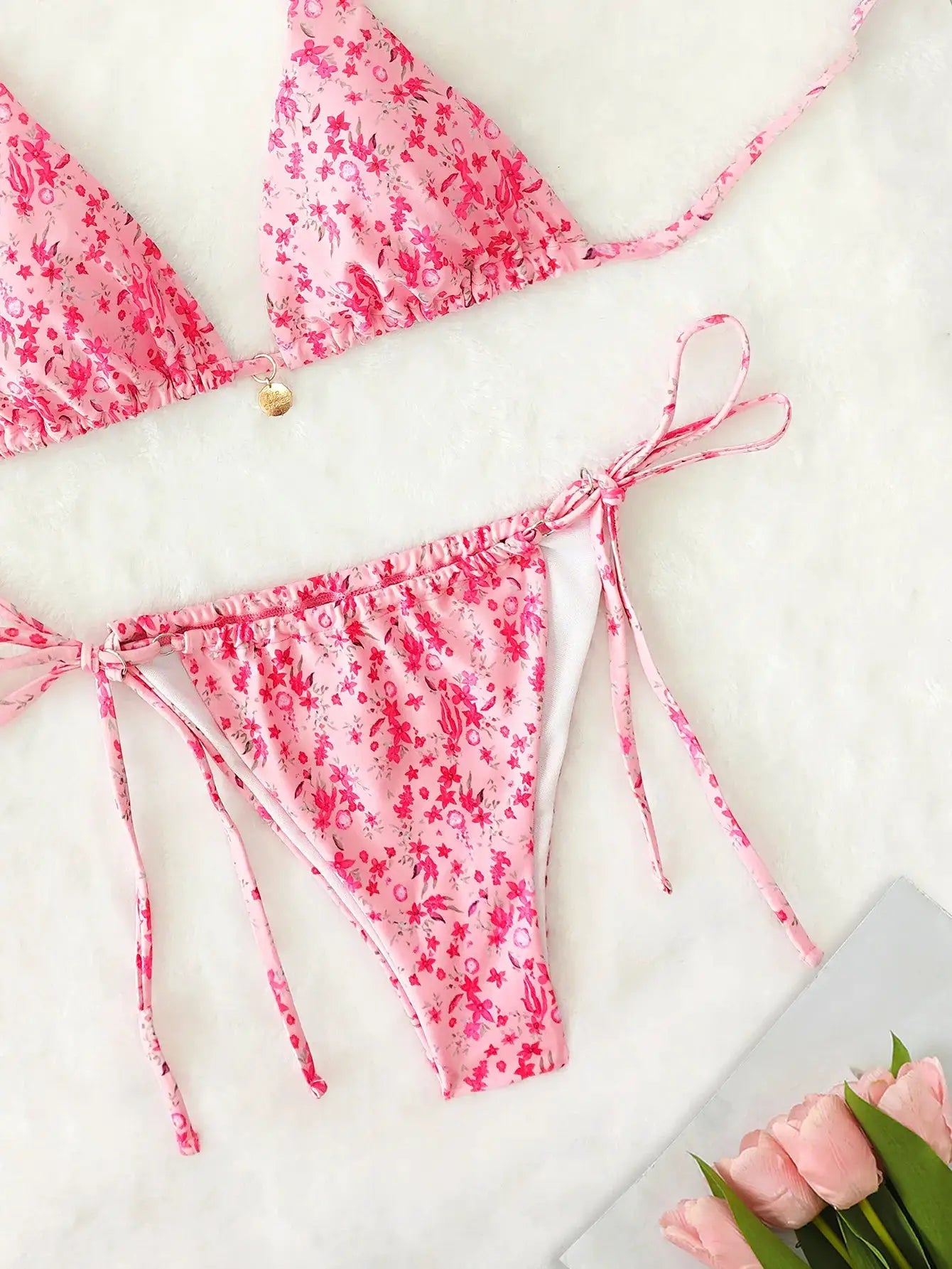 Pink floral triangle push-up bikini set with string ties and Brazilian bottoms by Simples Market