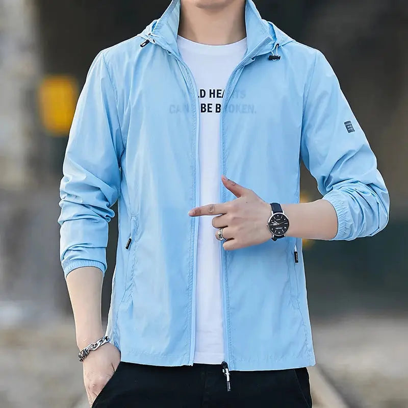 Light blue windbreaker jacket by Simples Market; lightweight, breathable UV-protection clothing