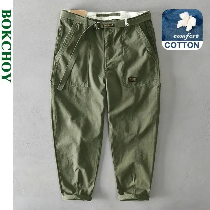 Men's olive green cotton cargo pants by Bokchoy with belt, front patch pockets, and cuffed ankles.