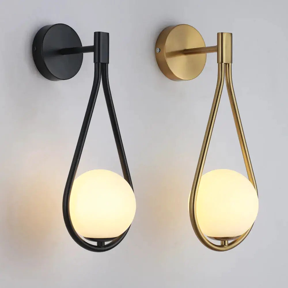Nordic glass-ball LED wall lamp with black and brass metal finishes, two modern minimalist wall sconces