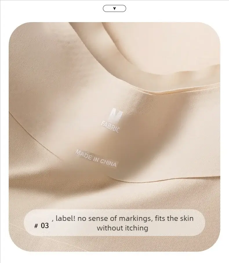 Women's beige bra close-up; interior fabric label visible on soft nude fabric.