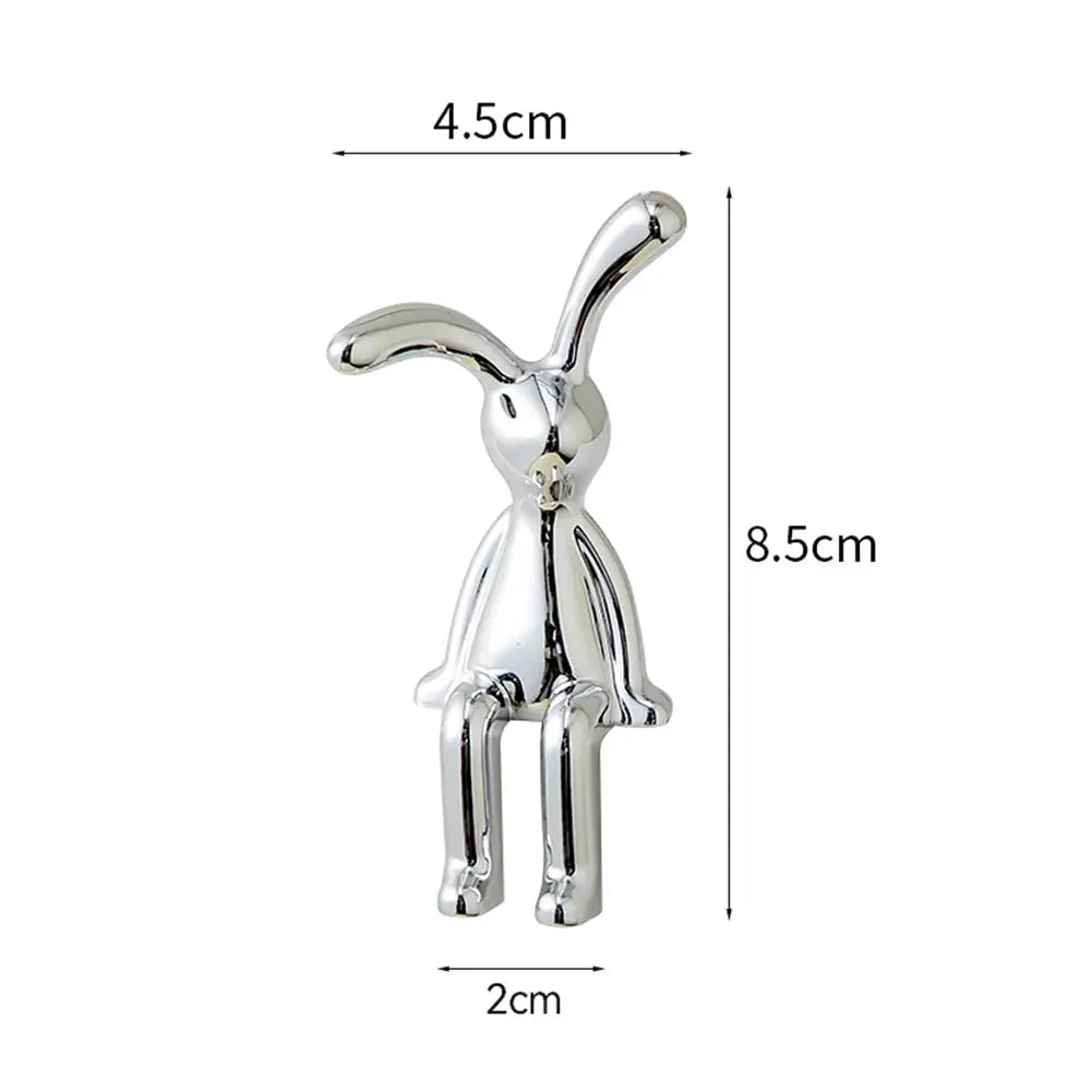 Chrome rabbit figurine for car center console and desk decor, 8.5 cm tall
