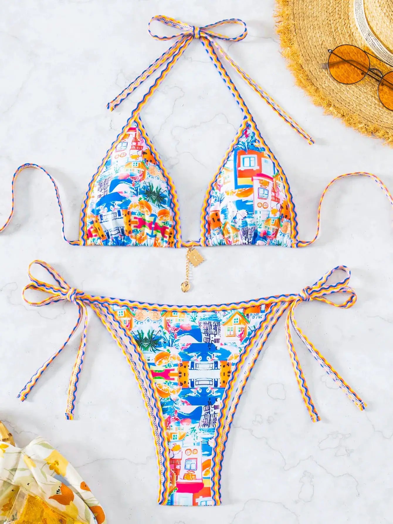 Two-piece floral-print triangle bikini with braided yellow-blue-orange trim