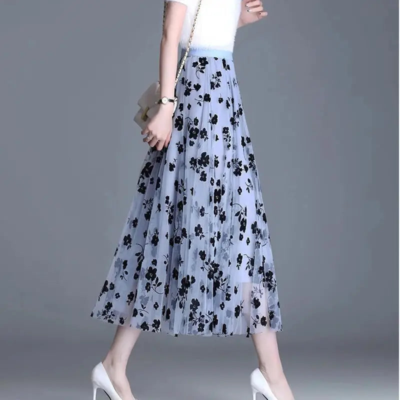 Floral tulle midi skirt by Simples Market in light blue with black flowers