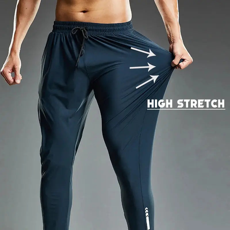Men's navy blue running pants with drawstring waist and high-stretch fabric