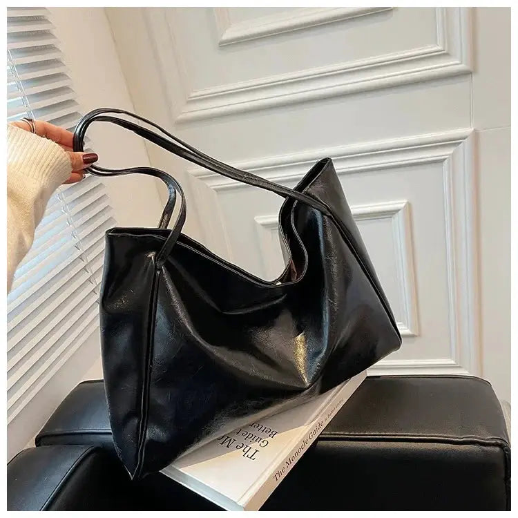 Tote bag in black PU leather with long double handles, large capacity, casual crossbody style
