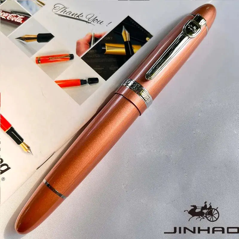 Jinhao 159 fountain pen with pink metallic finish and silver trim, converter included