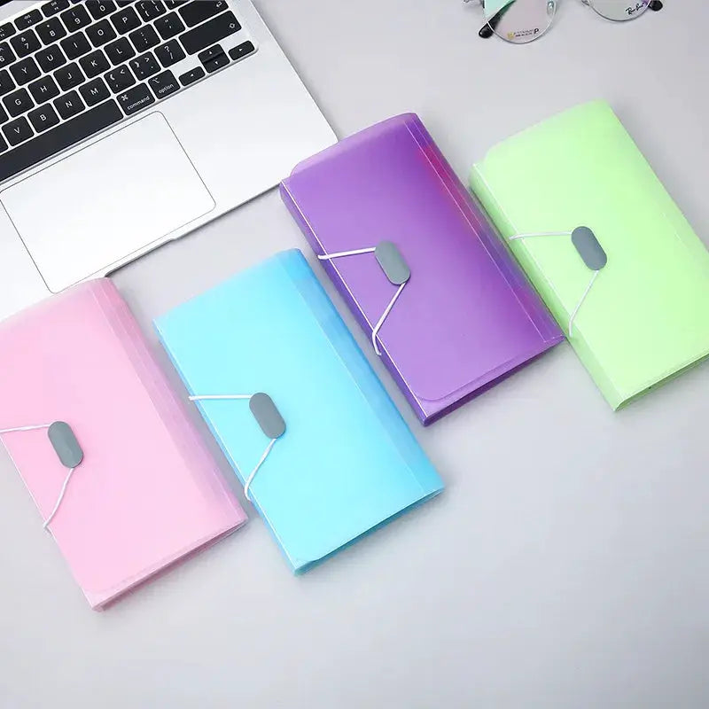 A6 expanding file folders set of four by Simples Market in pink, blue, purple, green with elastic closures