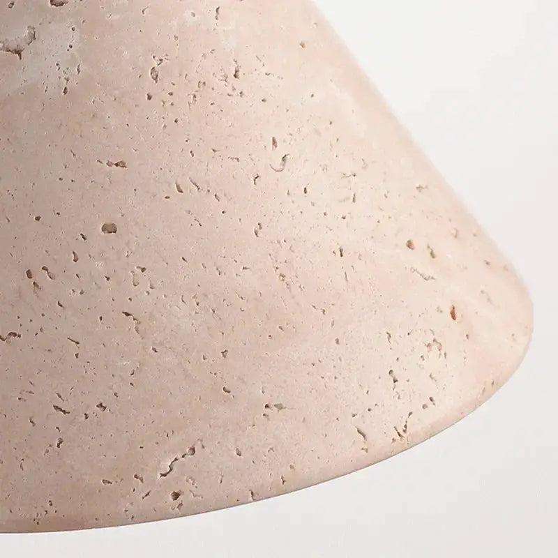 Travertine wall lamp in warm yellow, textured natural stone sconce