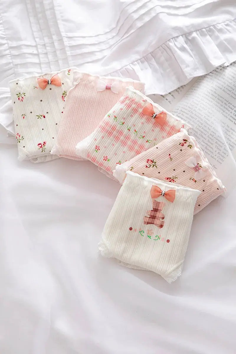 Panties 5-piece set in pastel pink/cream floral cotton, mid-waist underwear with bow accents