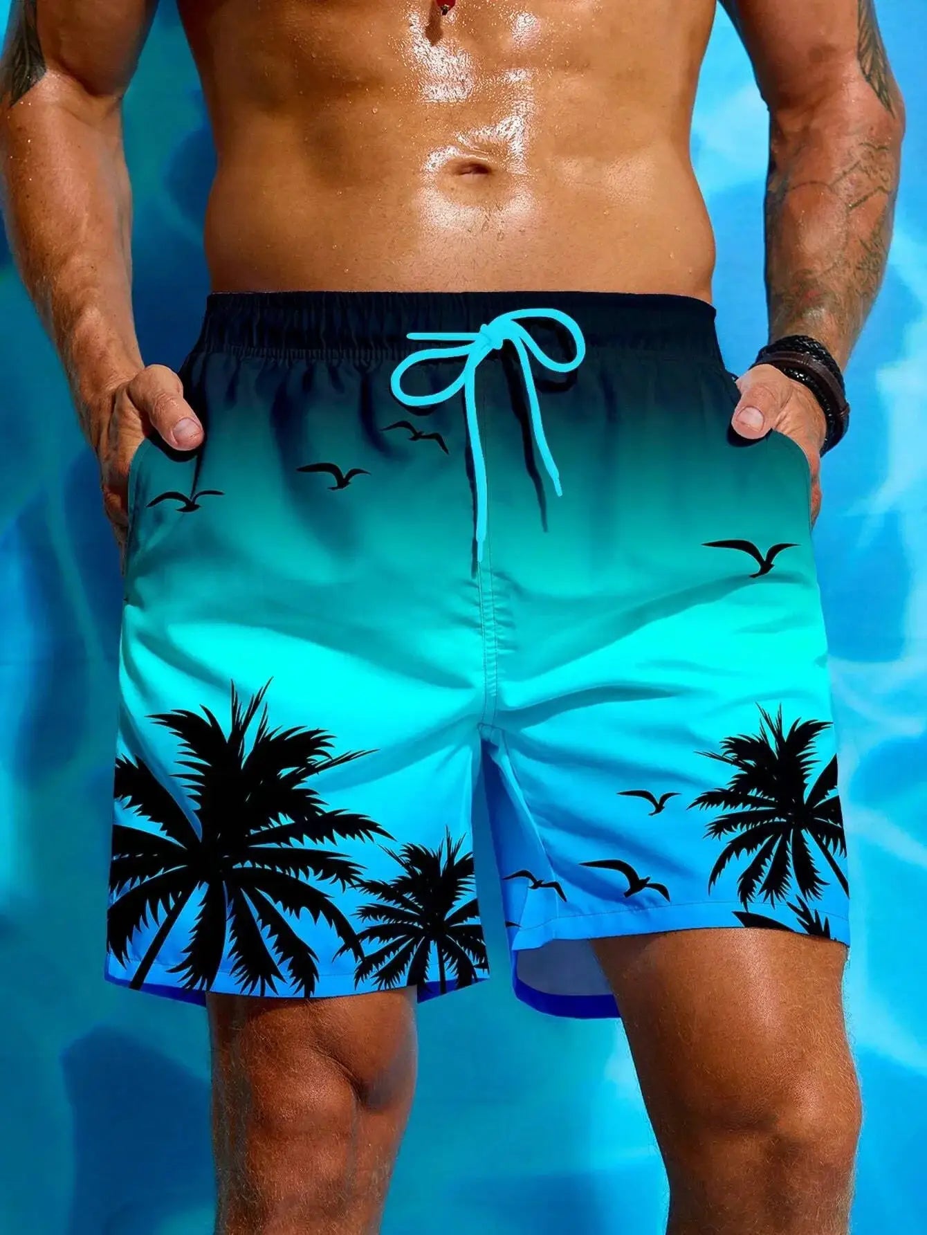 Board shorts by Simples Market in teal-to-cyan gradient with black palm print and neon blue drawstring.