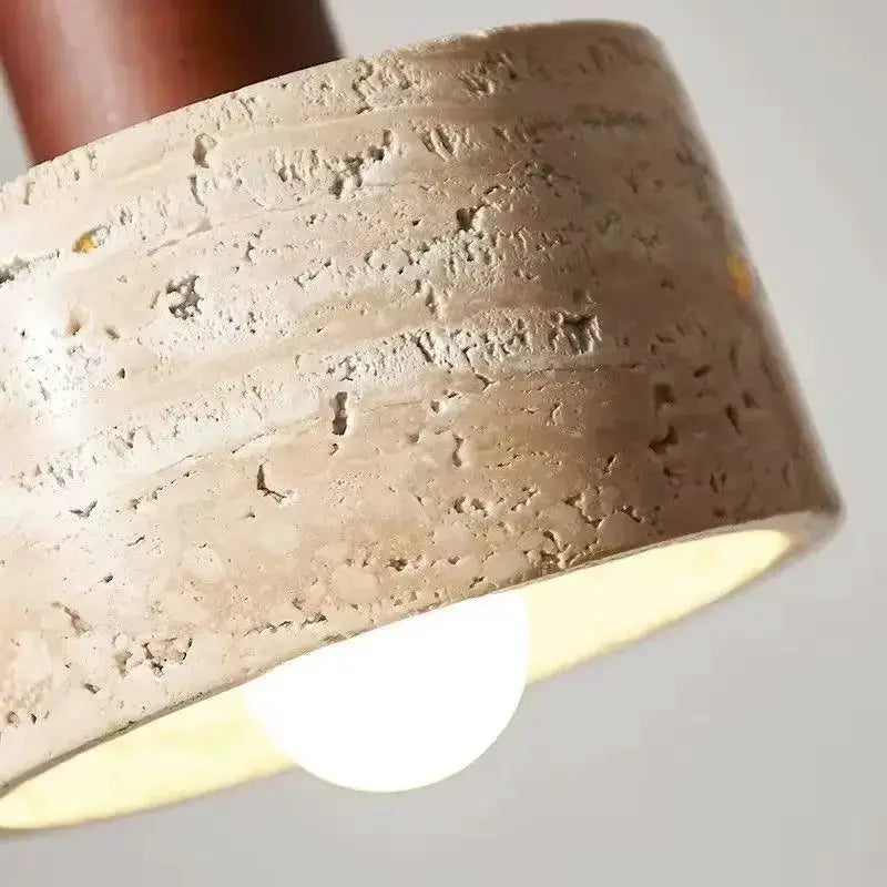 Travertine droplight pendant lamp with beige-yellow shade and exposed bulb