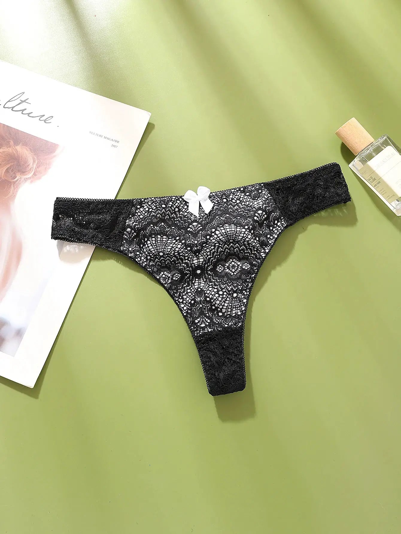 Simples Market black lace G-string panties with white bow, mid-low rise