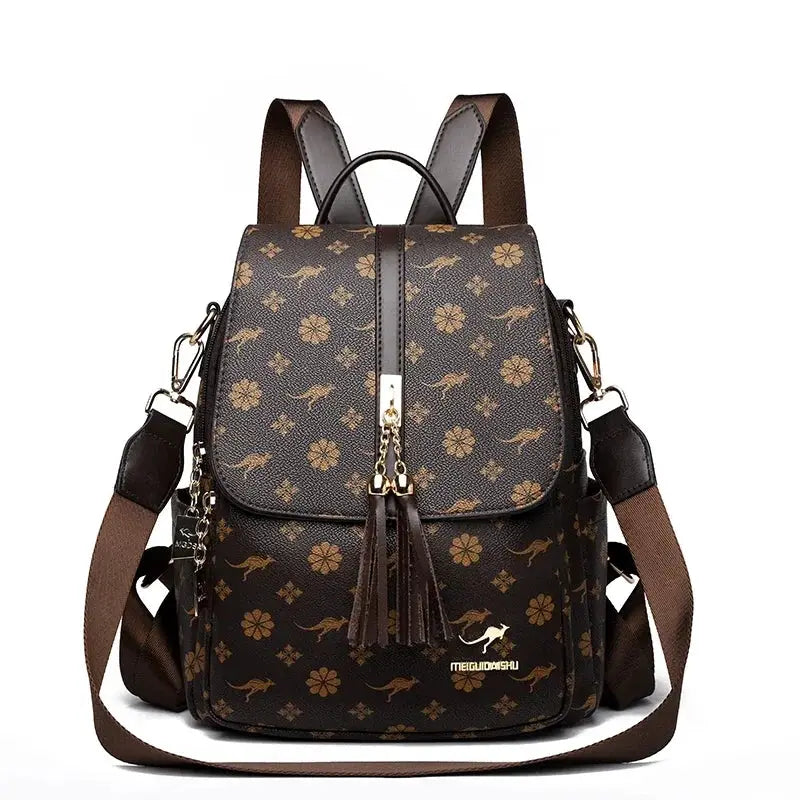 Simples Market ladies leather backpack in brown printed design with tassels, large capacity, and gold hardware