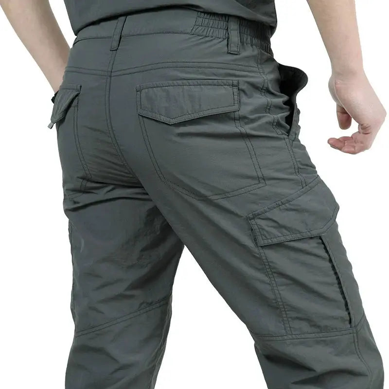 Men's outdoor waterproof tactical cargo pants, gray-green, quick-dry fabric with multiple pockets