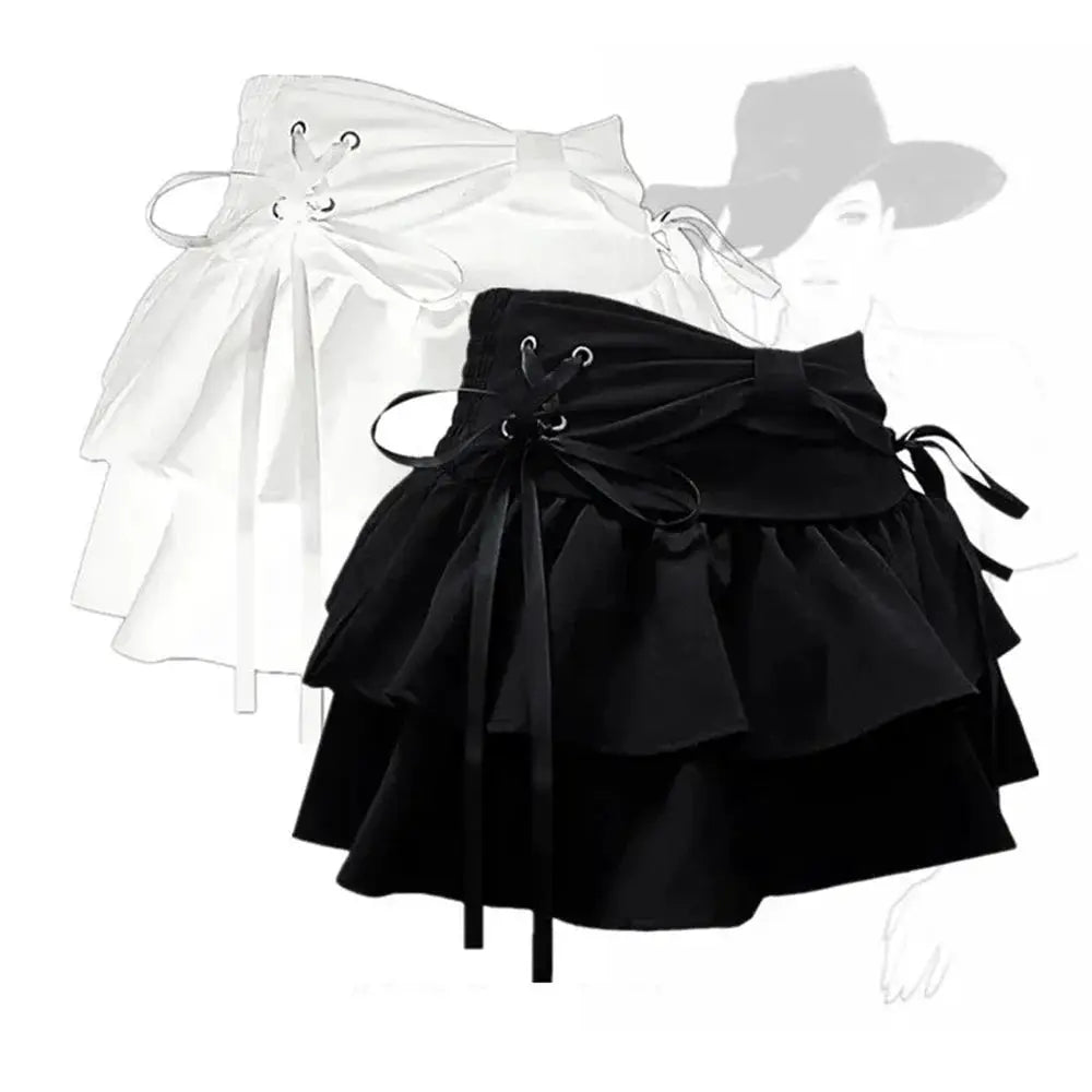 Women’s layered mini skirts set with bow accents and lace-up waists in black and white, 2-pack