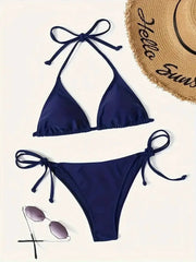 Bikini set navy blue by Simples Market with triangle halter top and tie-side bottoms.