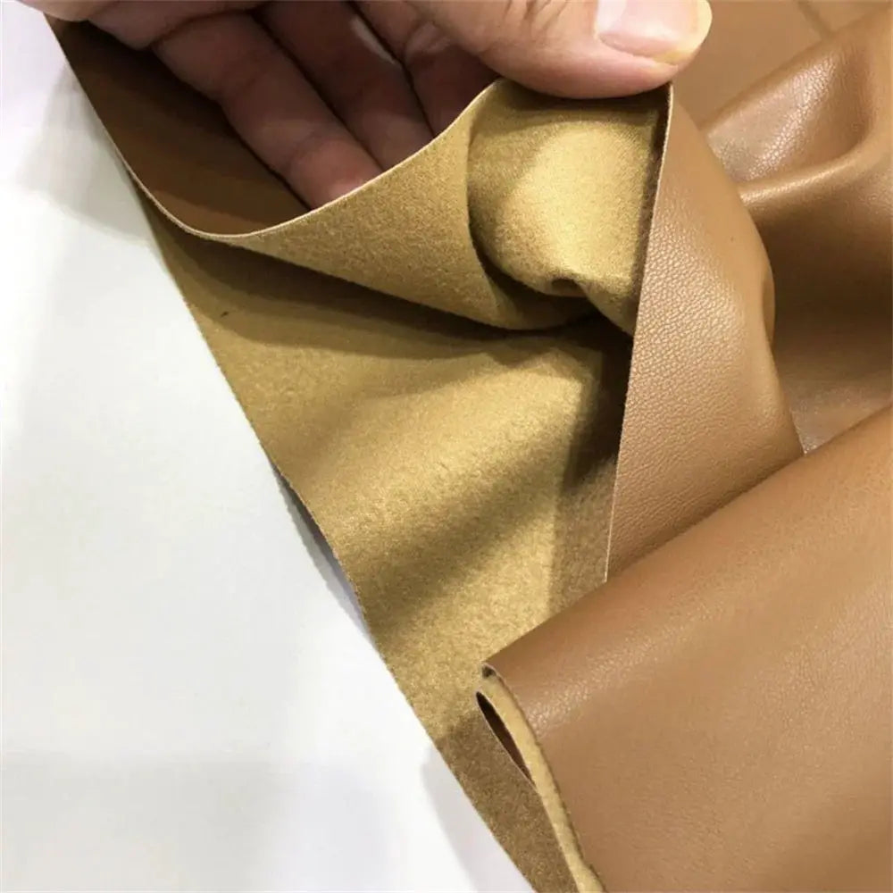 Women's PU leather midi skirt tan faux leather fabric close-up