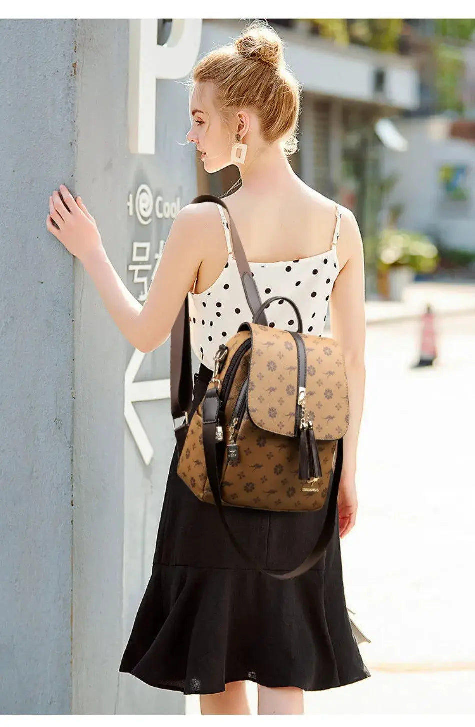 Backpack by Simples Market, tan leather with floral print, tassel accents, large capacity