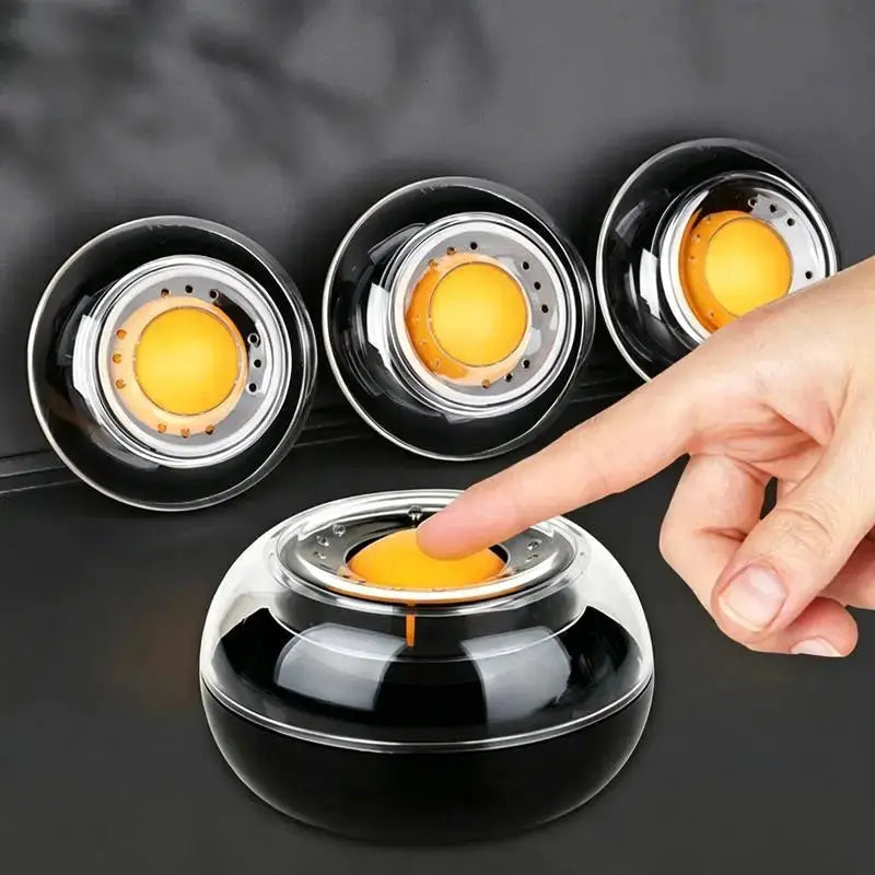 Simples Market finger-wet money counting tool; round black counters with orange centers (3 pcs)