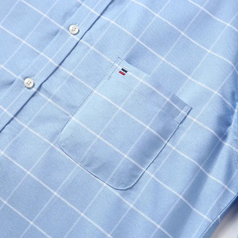 Men's oxford shirt in light-blue plaid, 100% cotton with chest pocket