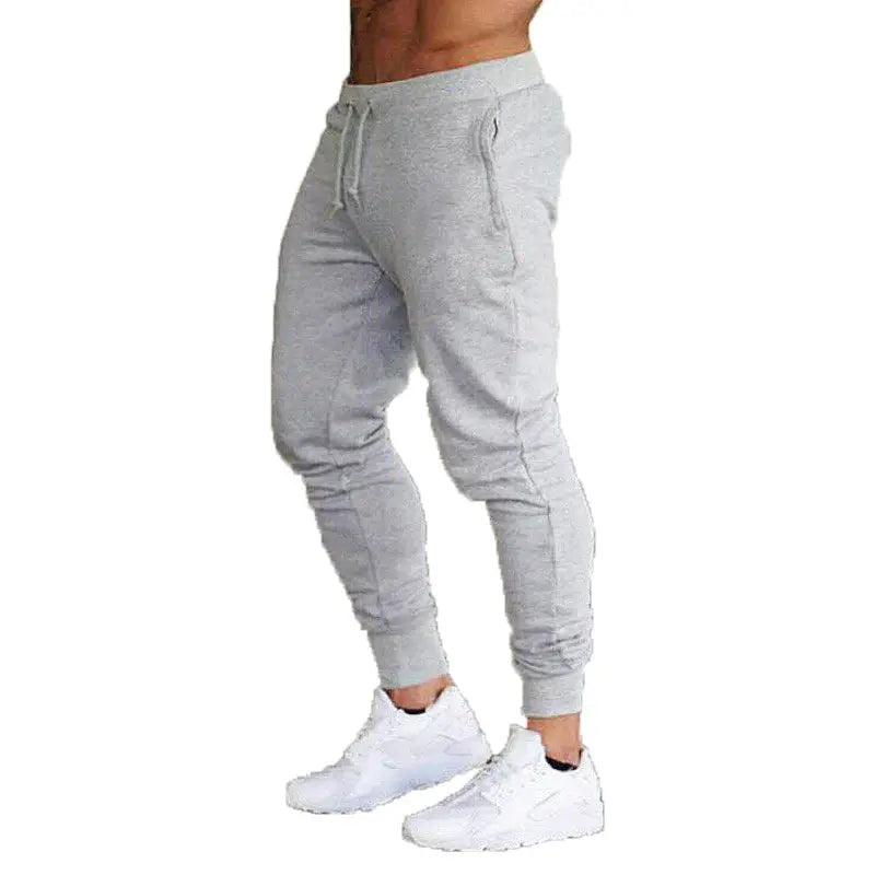 Gray jogger sweatpants with drawstring waist and cuffed ankles, unisex casual sport pants