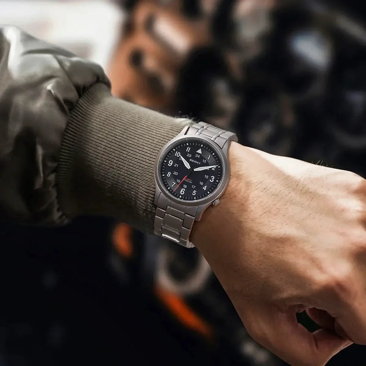 BERNY titanium men's field watch on metal bracelet with black dial and white numerals